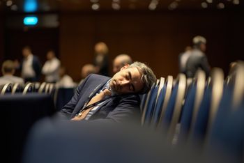 Bored conference delegates