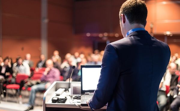 man about to speak at conference