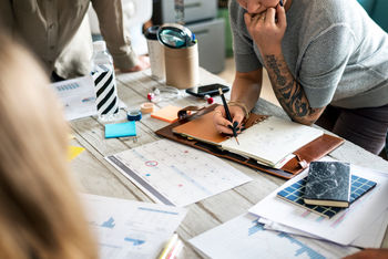 meetings planners taking notes