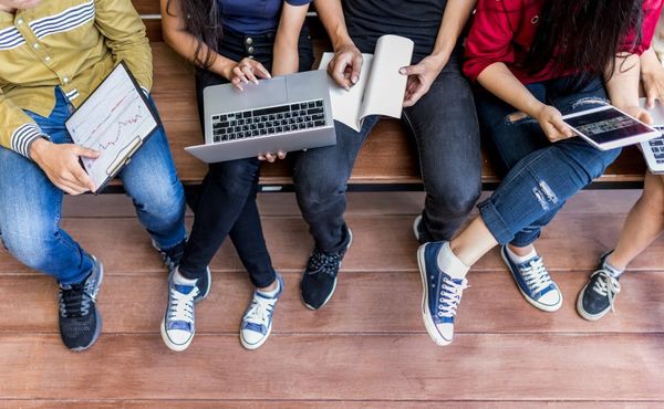 Students on a bench aerial shot