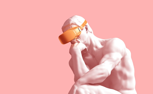 Rodin's The Thinker with VR headset on