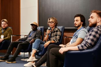 panel discuss at meeting