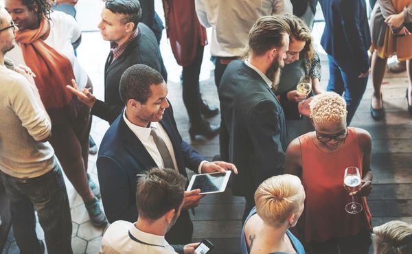 People mingling at a conference 
