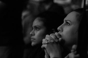 Women listening intently at conference