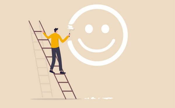 Man up stepladder painting smiley face