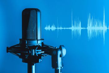 mic and headphones podcasting