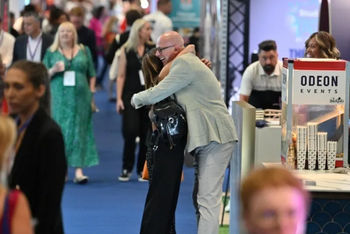 Martin Balmer hugging a client at TMS