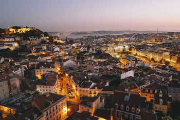 Lisbon city rooftops by night