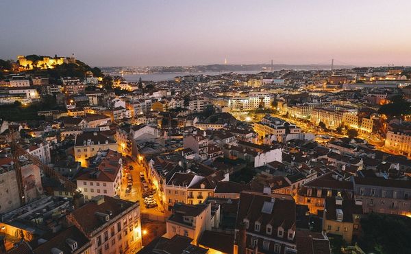 Lisbon city rooftops by night