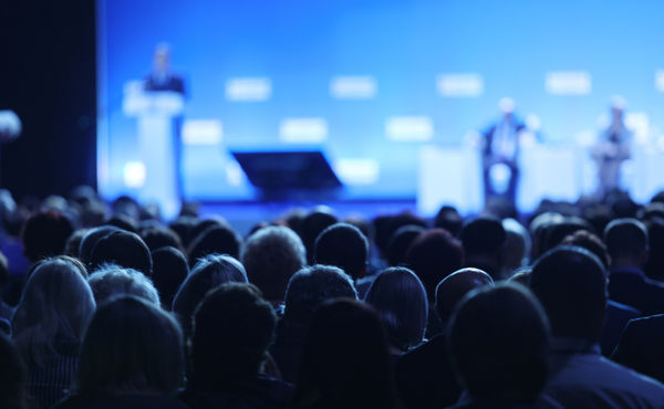 Conference in darkened room