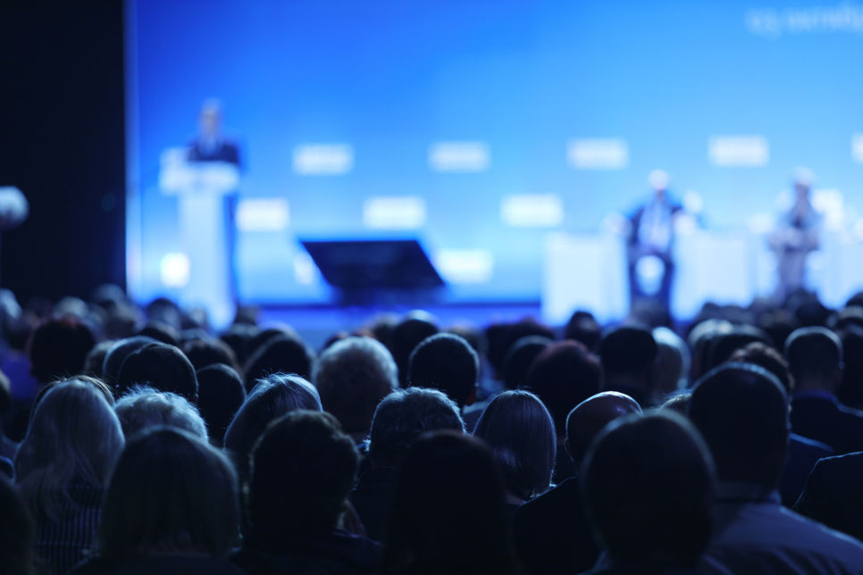 Conference in darkened room