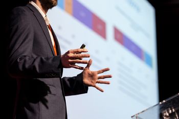 Man standing at lectern