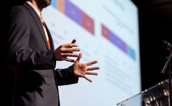 Man standing at lectern