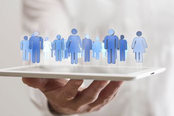 Image of computer generated avatars floating on a laptop to represent membership