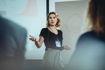 Generic image of beautiful speaker at conference