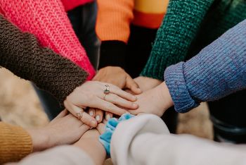 hands joined in middle 