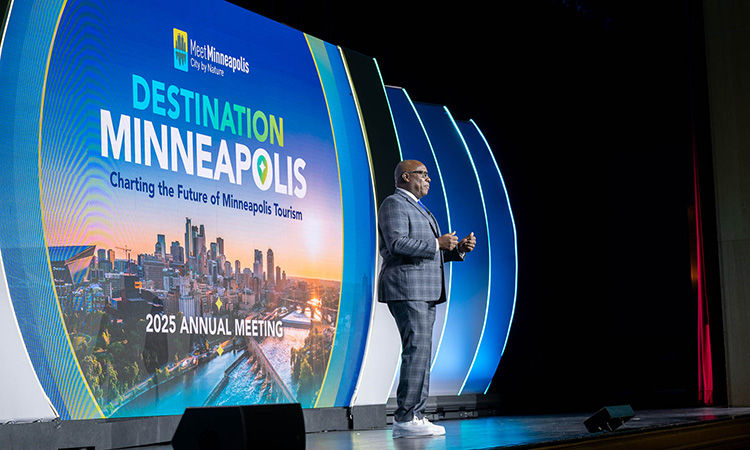 Meet Minneapolis CEO Melvin Tennant speaks at the organization's 2025 annual meeting.Source: Meet Minneapolis
