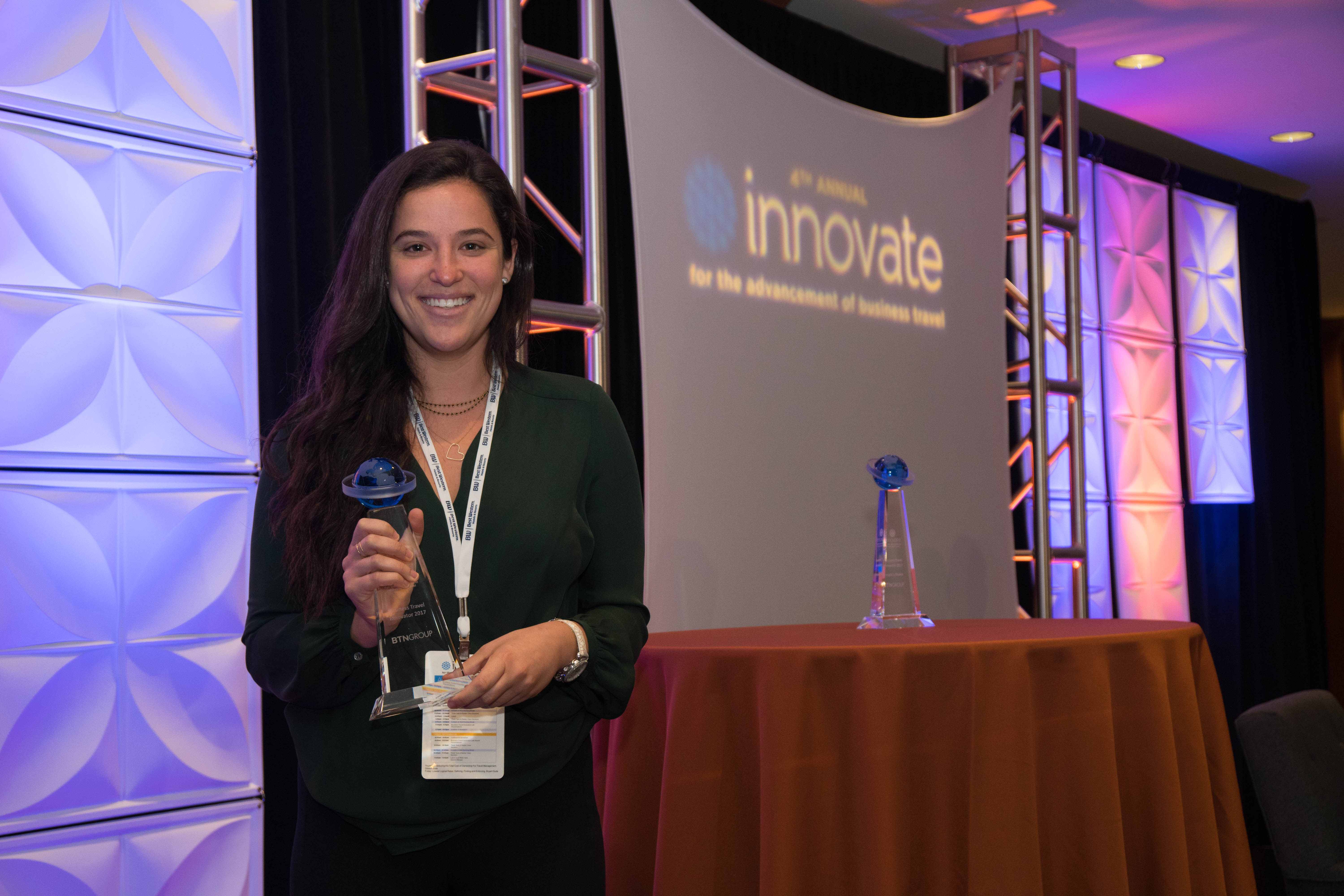 SpotHero for Business' Becca Rabinowitz accepts the BTN Group's 2017 Business Travel Innovator Award.