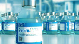 Vaccinated people can gather safely but should avoid travel for now, says US CDC