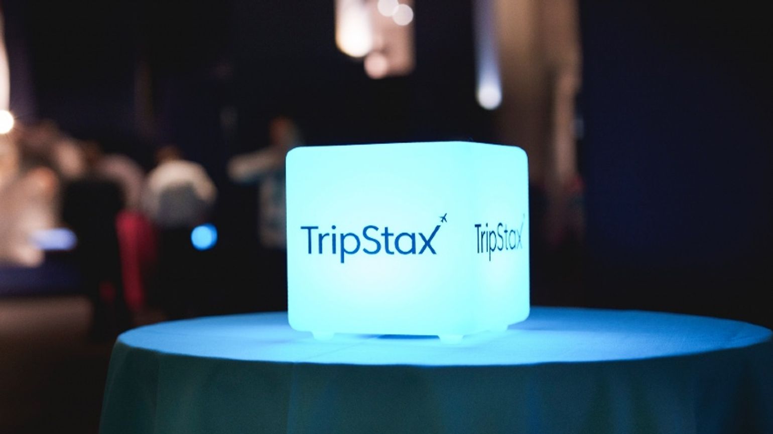 TripStax logo on table