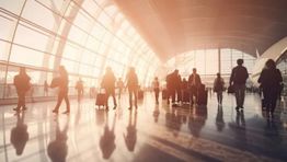 Busy airport terminal AdobeStock