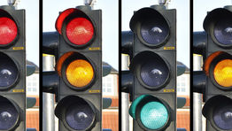 UK’s traffic light system criticised for huge costs and disruption