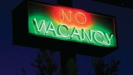 Accor to split business