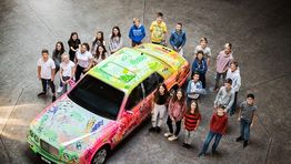 Hotel limo turned to graffiti art by school children