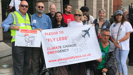 Campaign urges travellers to “fly less”