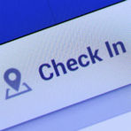 Why check in on holiday but not on business?