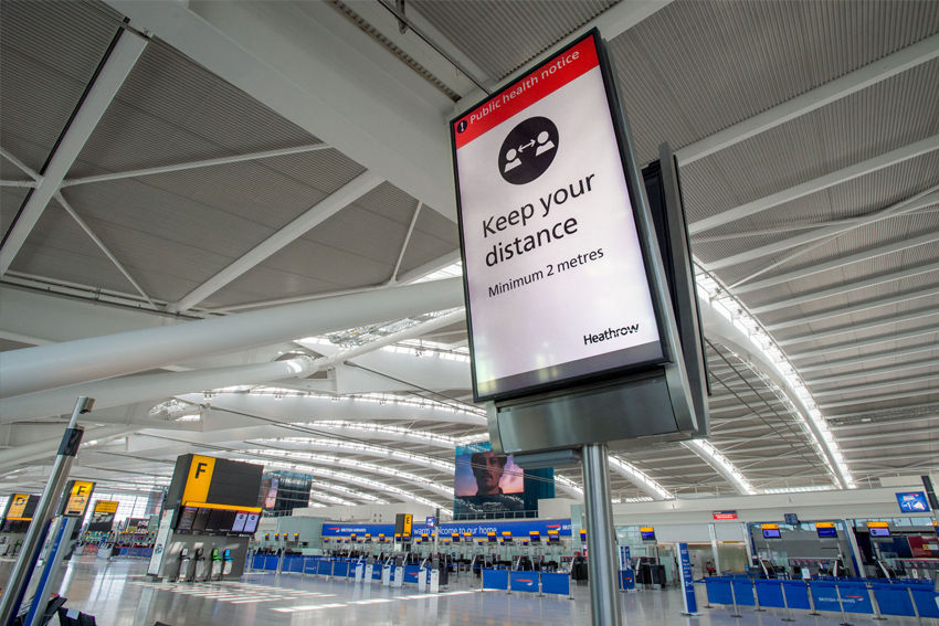Heathrow airport keep your distance sign