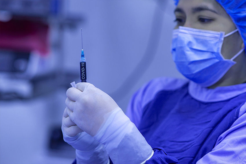 Many companies will require business travellers to be vaccinated 