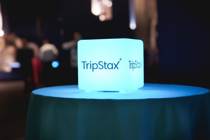 TripStax logo on table