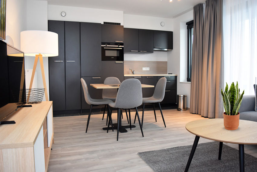 Advantage and WIN sign serviced apartments deal