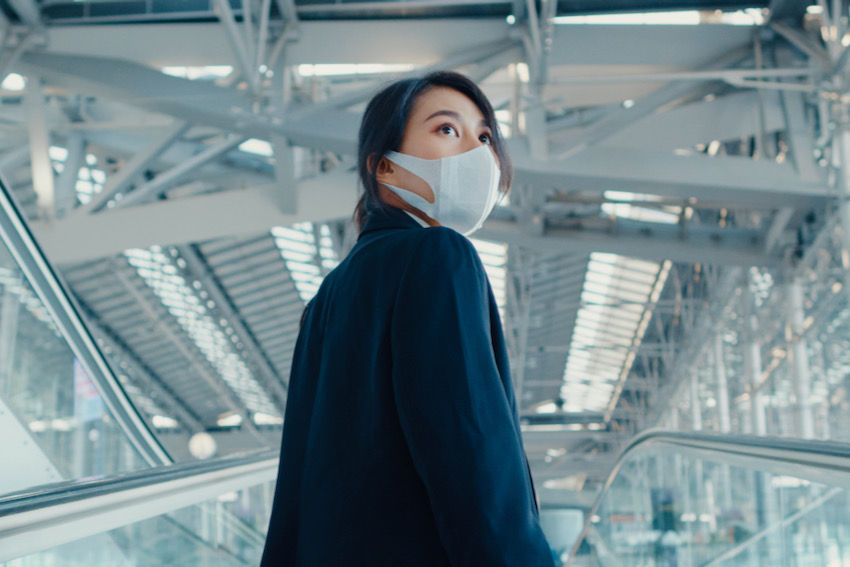 Female business travel airport face mask