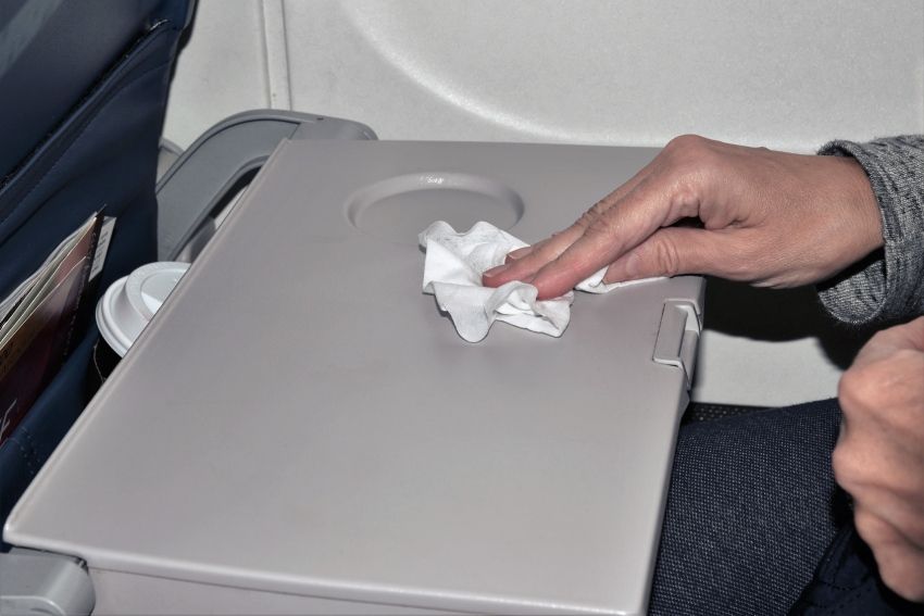 Cleaning plane tray table
