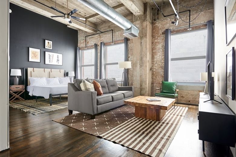 Reside Houston Downtown room and common space Reside Houston Downtown room and common space