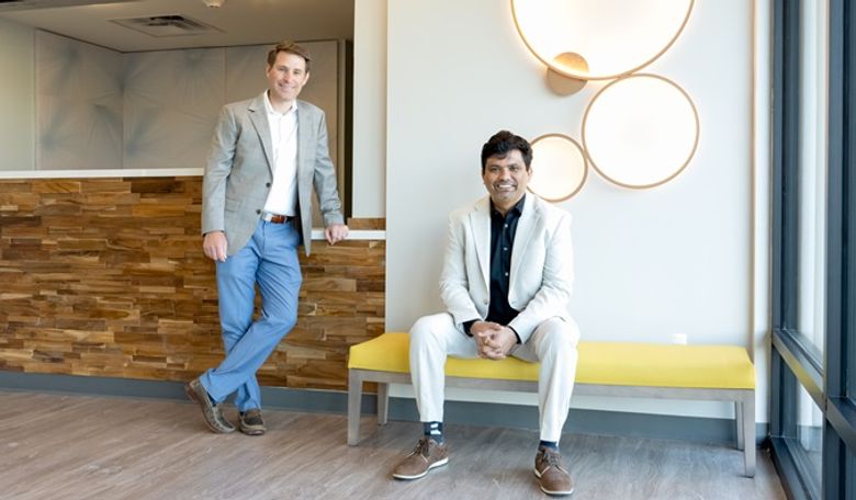 Philip Cox,Cox Universal Group (l.), and Wyndham's Krishna Paliwal in the lobby at the first Echo Suites. Philip Cox,Cox Universal Group (l.), and Wyndham's Krishna Paliwal in the lobby at the first Echo Suites.