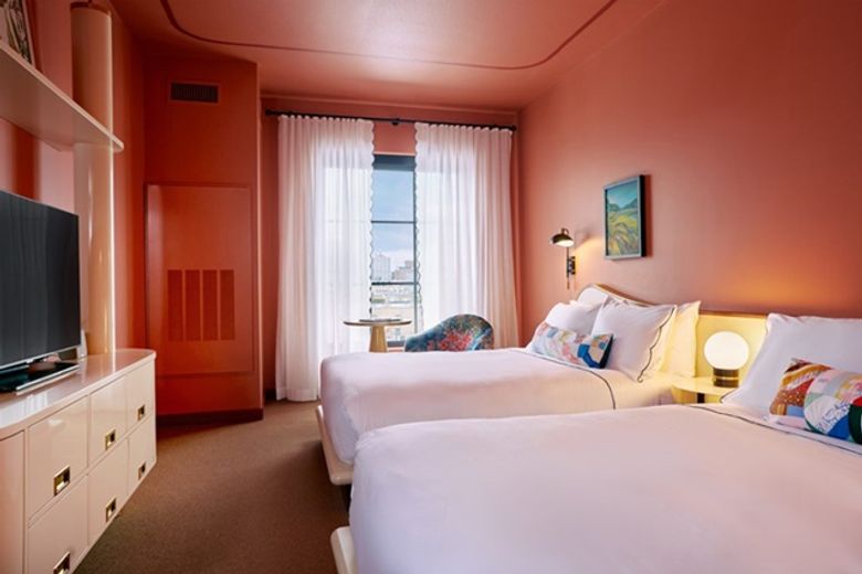 Guest room at Hotel Genevieve in Louisville, Kentucky