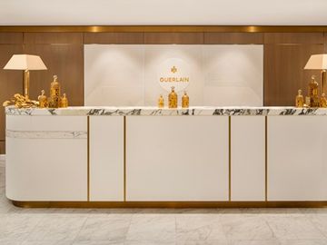 Hilton beats Street on better expenses