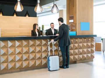 STR, Tourism Economics downgrade hotel forecast