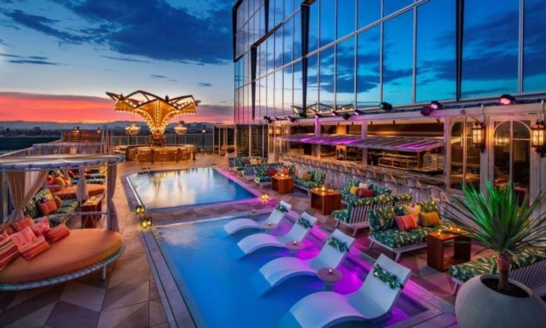 Golden Hour is a rooftop pool deck and rotating carousel bar.
