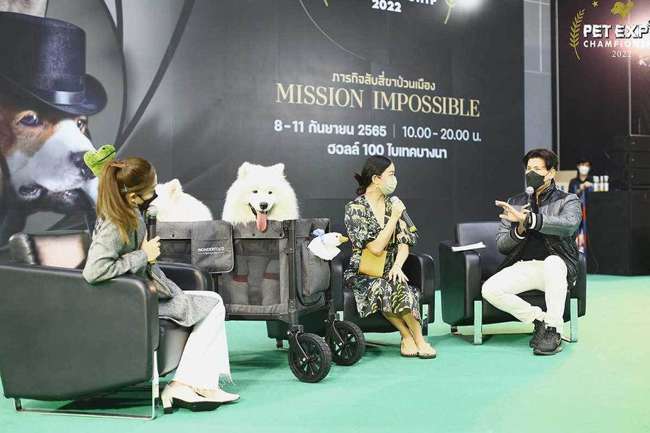 Furry attendees join in the fun with owners during a panel discussion at Pet Expo Thailand.