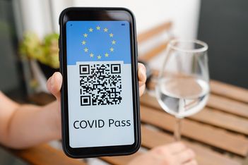 England mandates Covid passes for large events