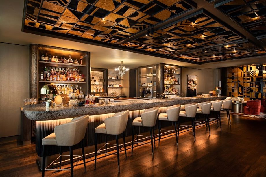 Mandarin Oriental, Singapore’s MO Bar offers drinks and views of F1 action.