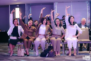 Attendees partook in stretching exercises during the knowledge sessions at TIME 2025.