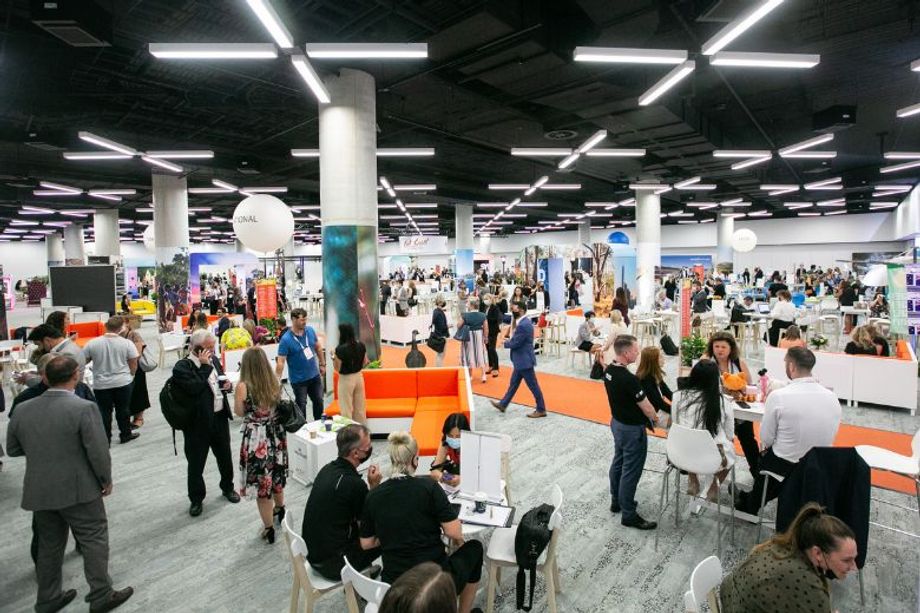 A red carpet flowing around demarcated zones, open floor design, and more food stations than usual helped facilitate social distancing without compromising on engagement.