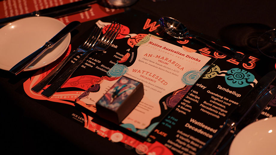 Gala dinner place setting designed by indigenous young talent.