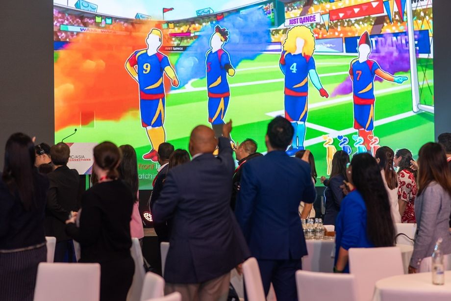 Delegates were tasked to work together to dance to catchy tunes during the team bonding activity.