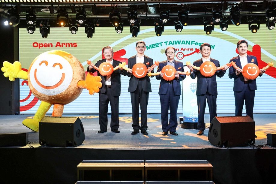 Industry leaders holding PaQ, the new mascot for MEET TAIWAN.